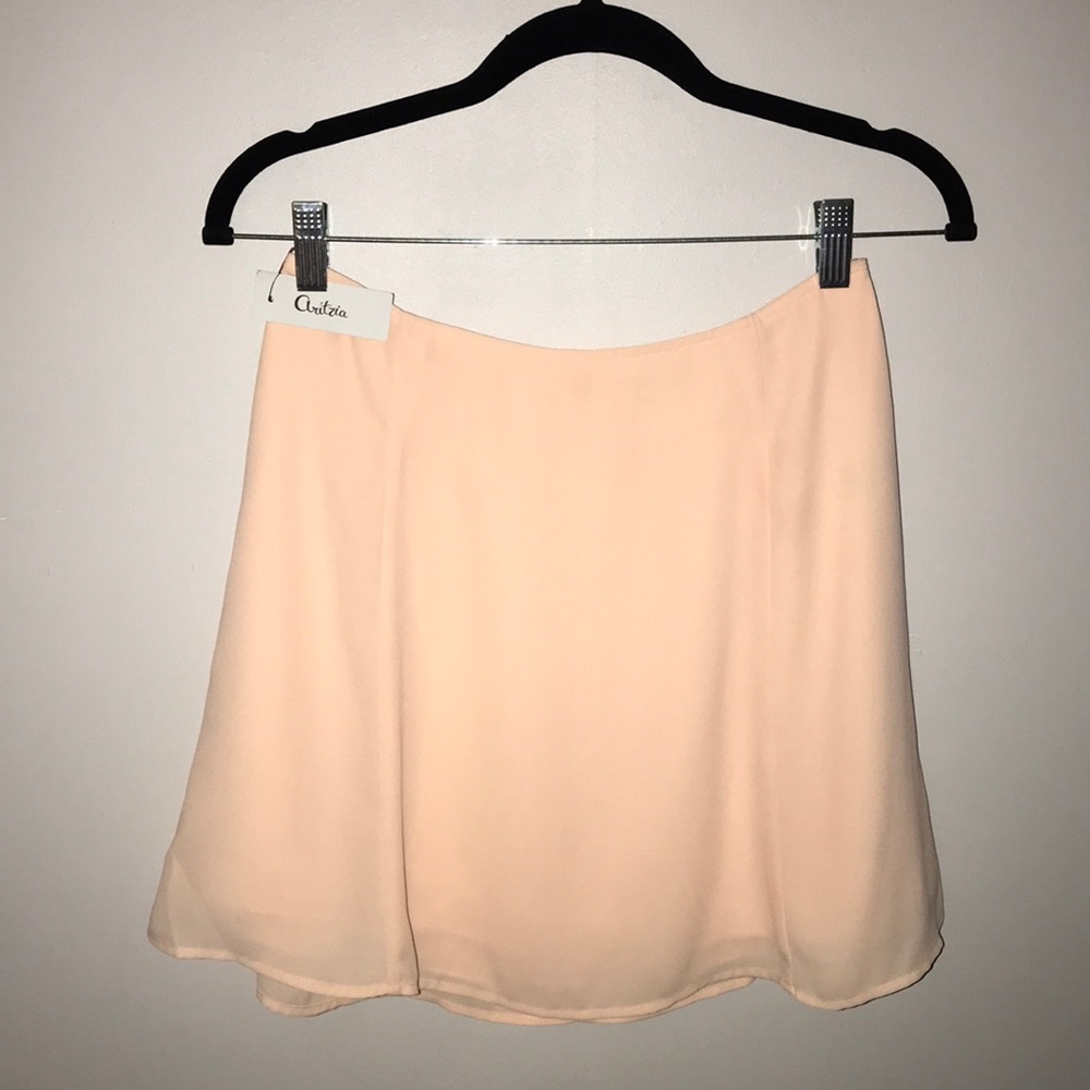 Aritzia peach skirt